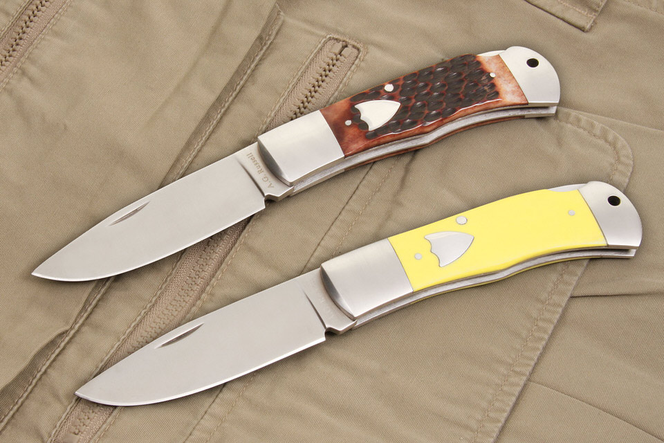 A.G. Russell Folding Hunter Drop point pocket knife in yellow delrin or jigged bone
